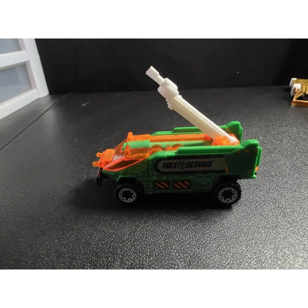 Lot of 4 loose Hot Wheels vehicles in pre-owned condition.